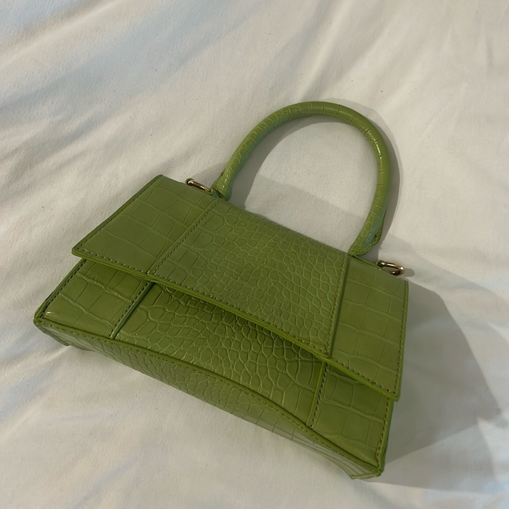 Green mini croc purse.